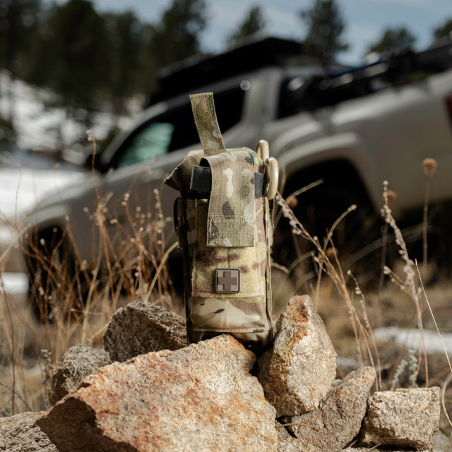D.A.R.K. Trauma Kit mounted to a vehicle rack for off-road trips