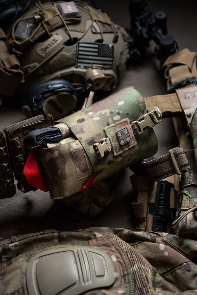 S.P.E.A.R. trauma kit on a plate carrier with tactical gear