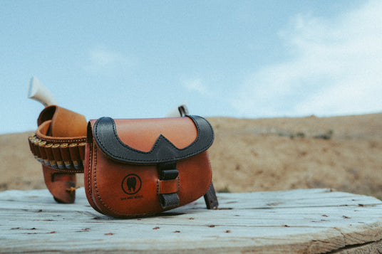 Frontier T.R.A.I.L. trauma kit mounted on a leather cartridge belt