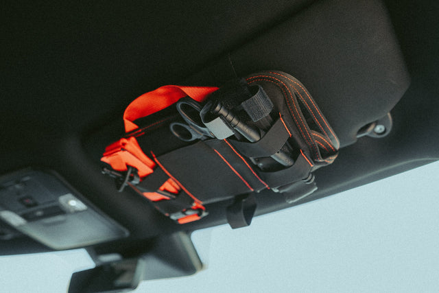 VISR vehicle trauma kit on the sun visor seen from the driver seat
