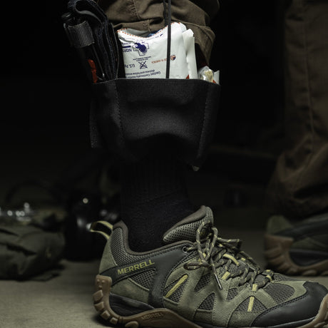 Ankle Kit worn over a boot with components being drawn