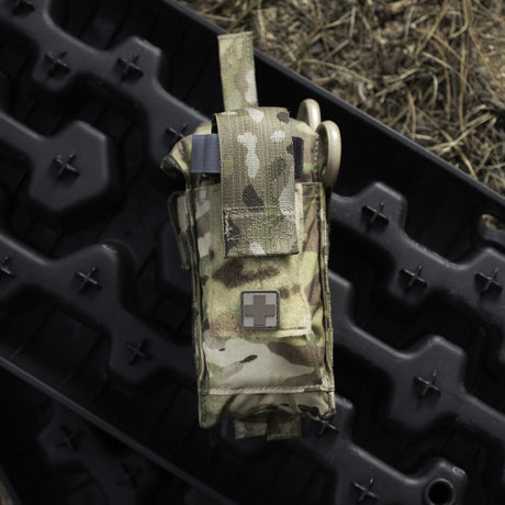 Multicam D.A.R.K. Trauma Kit mounted on a MOLLE panel