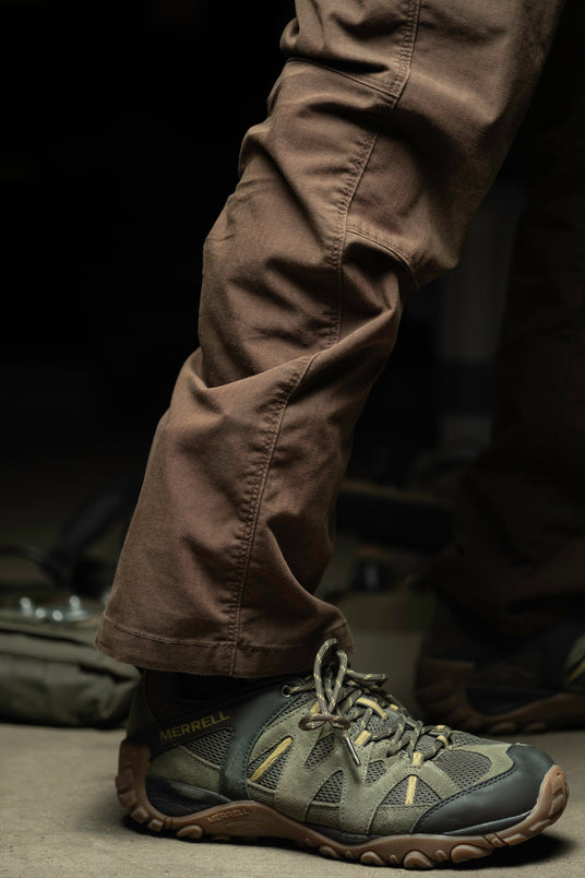 Ankle Kit trauma kit concealed under a pant leg while standing