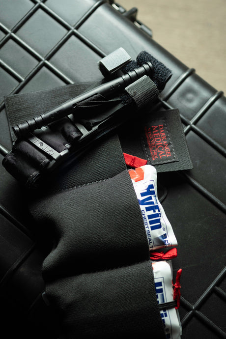 Tourniquet secured in the ankle trauma kit compartment detail