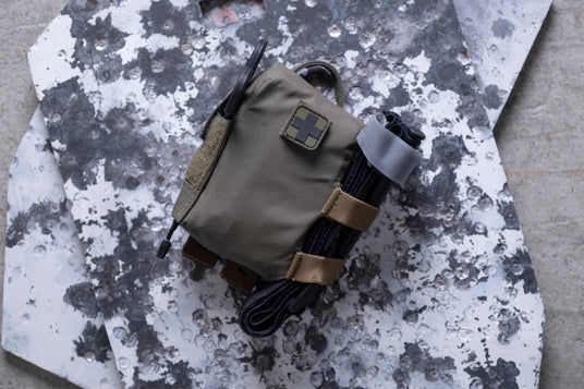 EDC Trauma Kit with a tourniquet held in the side elastic loops