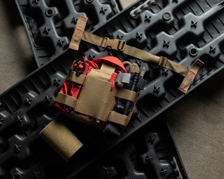 HEDR trauma kit staged on off-road recovery boards