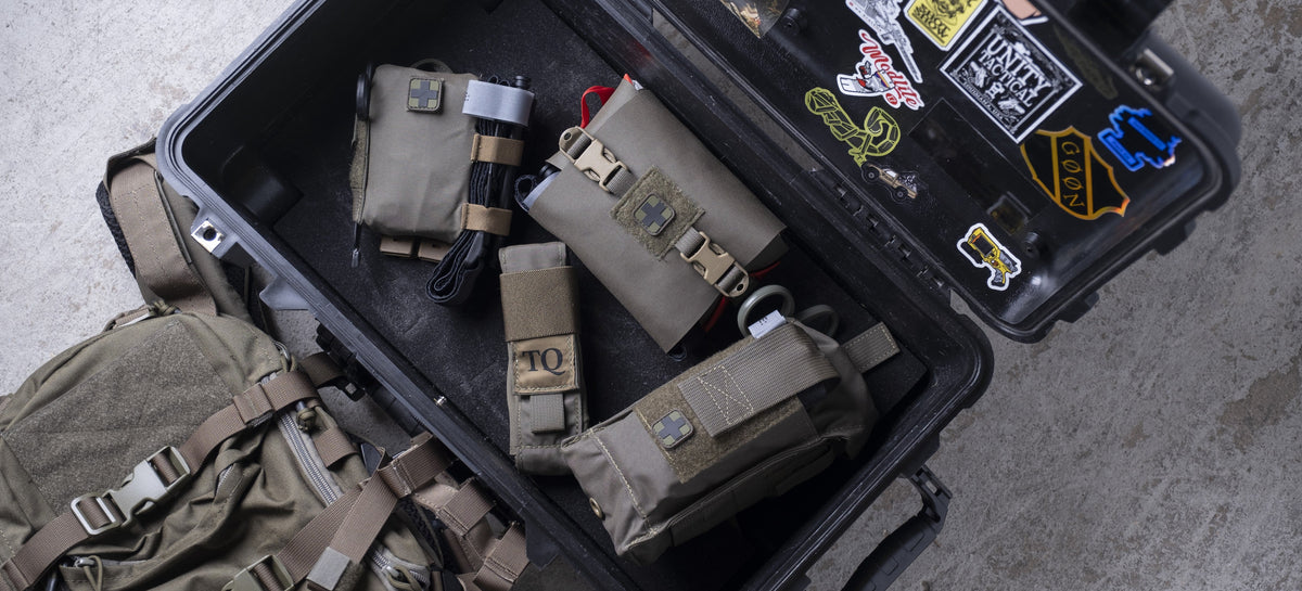 Dark Angel Medical trauma kits staged in an open hard case with a pack