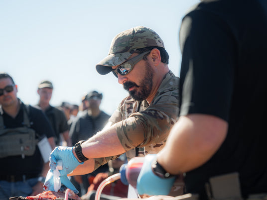 Dark Angel Medical founder Kerry Davis teaching wound packing at a range class