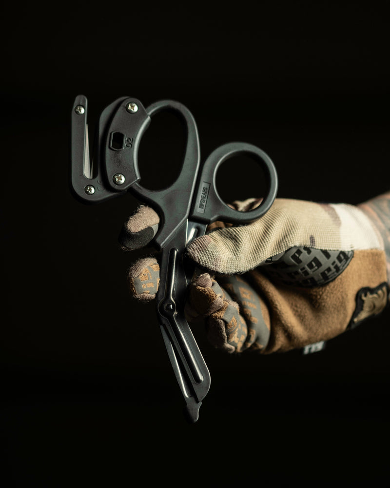 RipShears held in a gloved hand