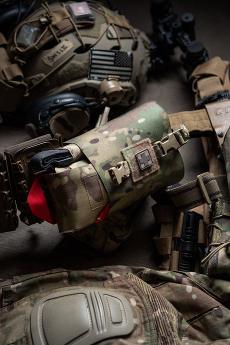 S.P.E.A.R. trauma kit on a plate carrier with tactical gear