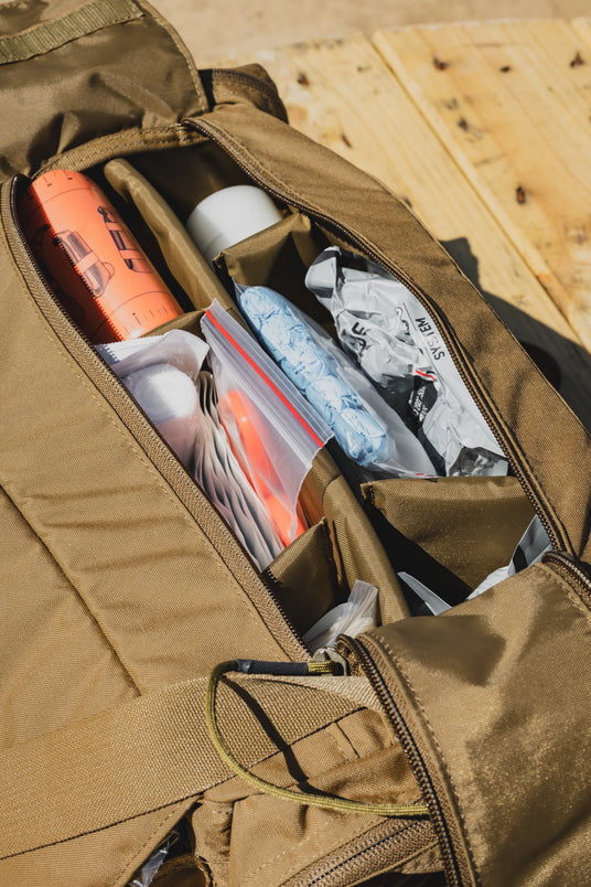 Inside the ST MIKE Bag trauma kit with bleeding control supplies staged for fast access